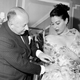 Christian Dior doing a fitting on Ava Gardner, 1956. Photo via AP Images.